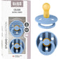 Sucette Bibs Colour Studio Lot de 2 – Ronde, Latex Naturel, Sans BPA – Bleu Ciel - Pin - Image 1